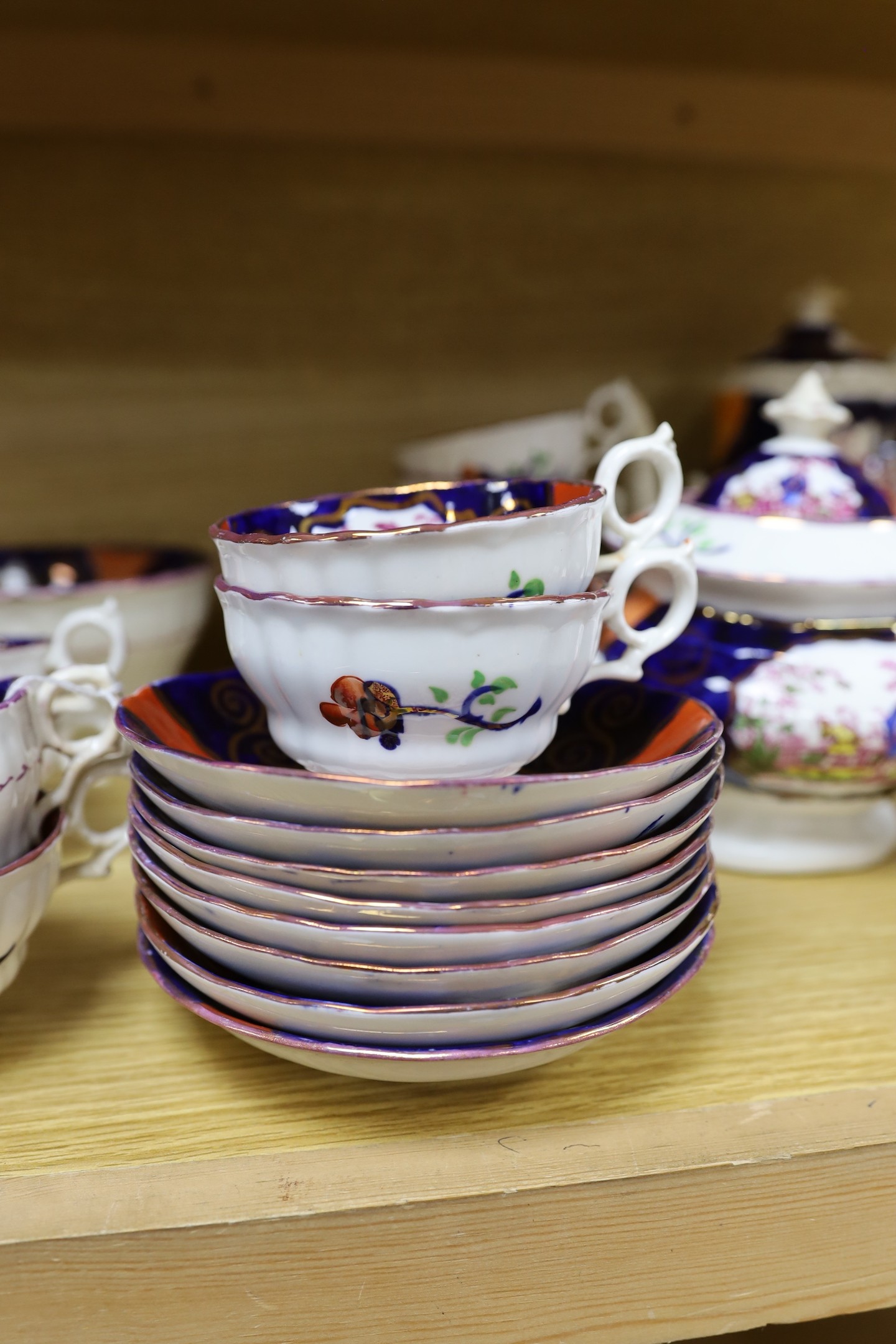 A quantity of Gaudy Welsh lustre tea wares with chinoiserie motifs